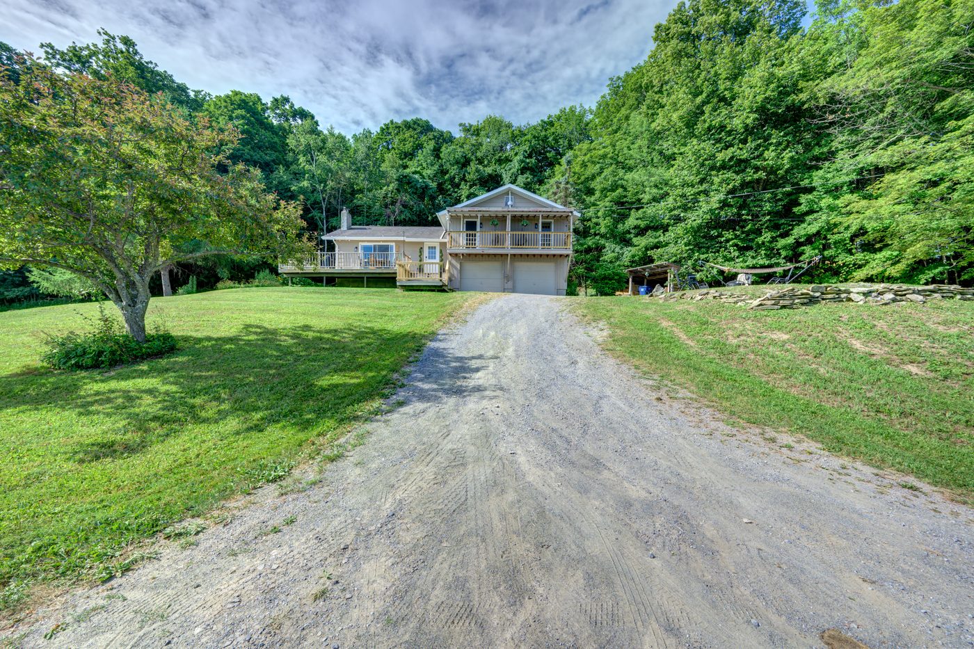 The gravel drive approaching the house
